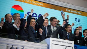 Sea executives when the stock began trading on the New York Stock Exchange. Photo by Getty.