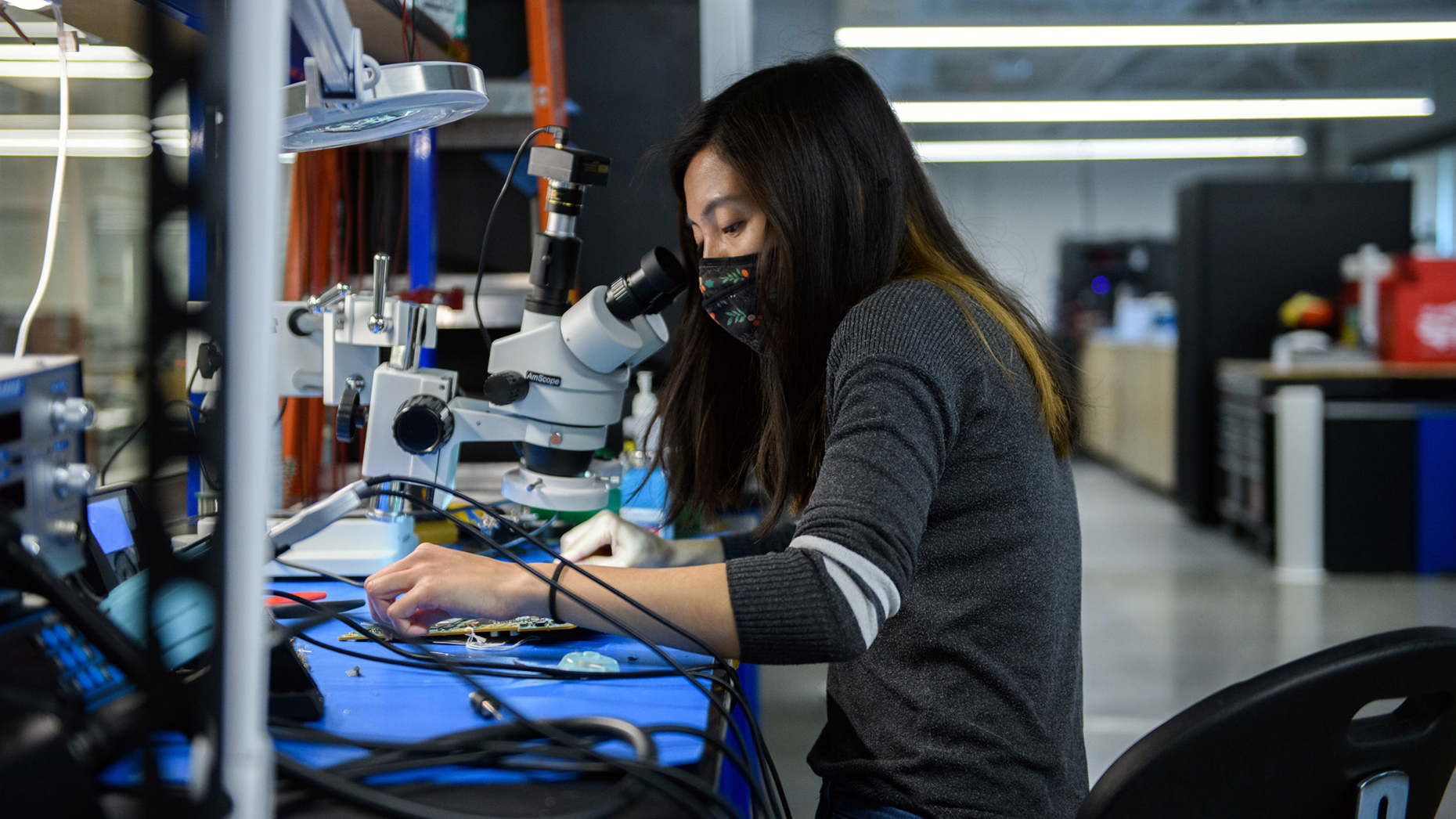 A hardware engineer works on argo lidar components. Photo by Argo AI.