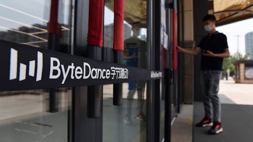 A ByteDance employee at the entrance to a ByteDance office in Beijing. Photo by Getty Images.