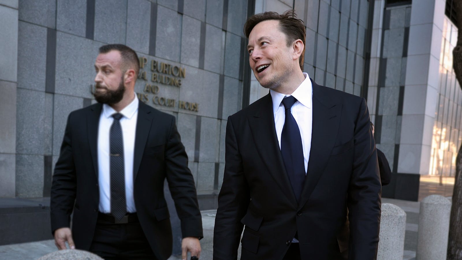 Elon Musk, right, last month. Photo by Getty.